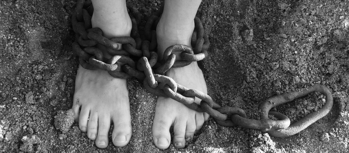 chains, feet, sand-19176.jpg